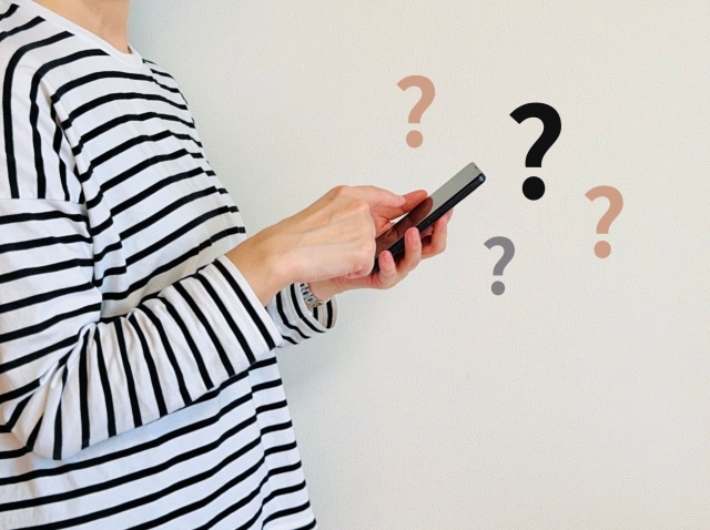 スマホとクエスチョンマーク